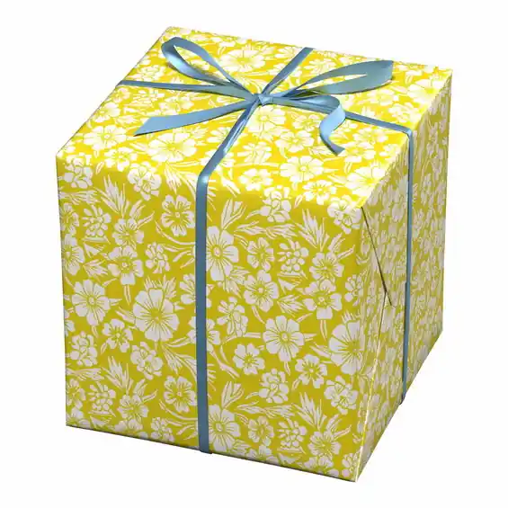 Presentpapper på rulle 10 m × 57 cm – gult papper med vita blomstermotiv - Dagens erbjudande